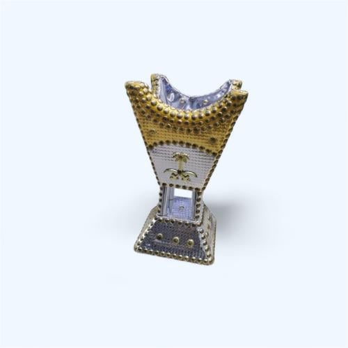 مبخرة معدنية مزخرفة بالرموز السعودية التقليدية.