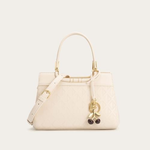 شنطة نسائية باللون البيج