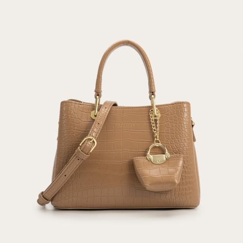 شنطة نسائية جلد باللون المشمشي