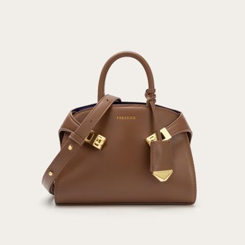 شنطة نسائية جلد باللون الكوفي