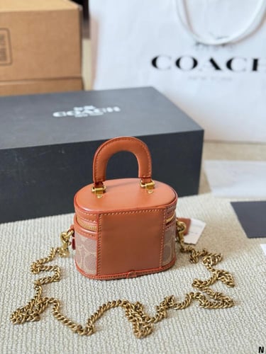 COACH شنط كوتش دلو (بني )
