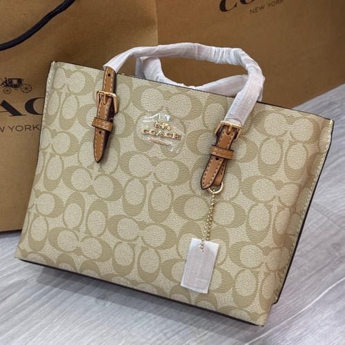 حقيبة يد كوتش