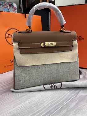 حقيبة هرمز ماستر جلد وقماش