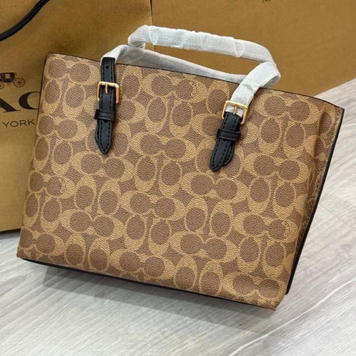 حقيبة يد كوتش