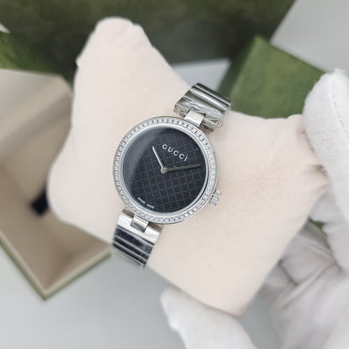 قوتشي G-timless