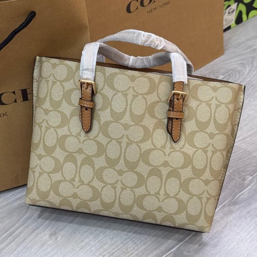 حقيبة يد كوتش