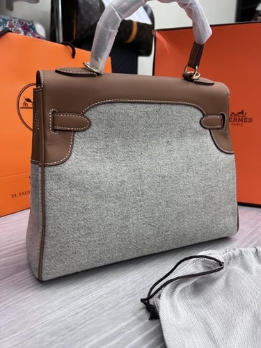 حقيبة هرمز ماستر جلد وقماش