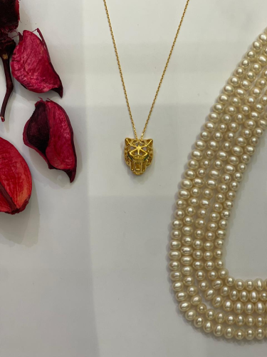 عقد ذهب عيار ٢١