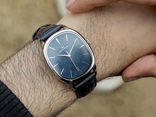 ساعة ريفو جلد كحلية و فضي 44