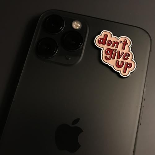 ملصق معدني | لا تستسلم