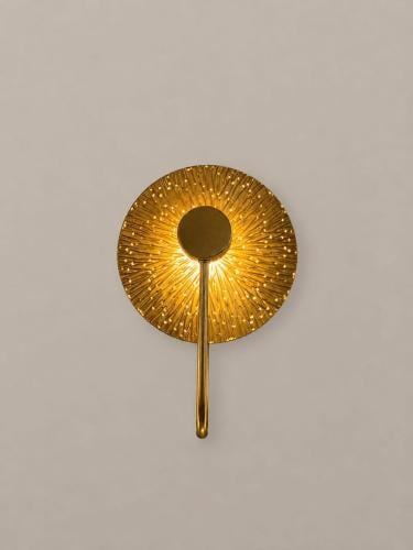 Round golden wall plaque