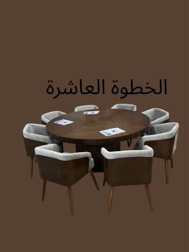 Dining table with eight wooden chairs, veneer, wit...