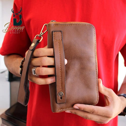 شنطة يد رجالية من الجلد الطبيعي - متعددة الاستخدام...