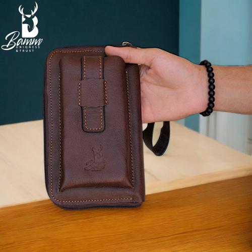 شنطة يد رجالية من الجلد الطبيعي - متعددة الاستخدام...