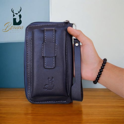 شنطة يد رجالية من الجلد الطبيعي - متعددة الاستخدام...