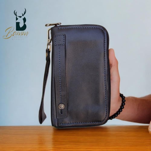 شنطة يد رجالية من الجلد الطبيعي - متعددة الاستخدام...