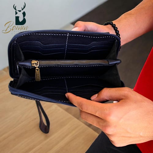 شنطة يد رجالية من الجلد الطبيعي - متعددة الاستخدام...