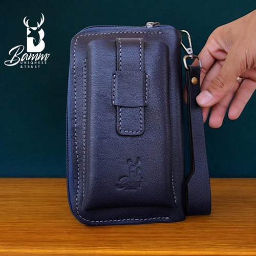 شنطة يد رجالية من الجلد الطبيعي - متعددة الاستخدام...