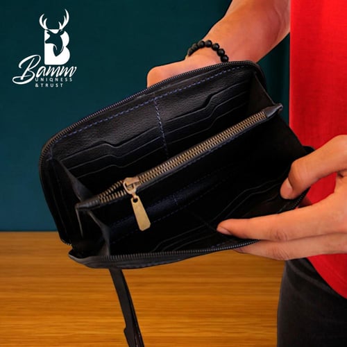 شنطة يد رجالية من الجلد الطبيعي - متعددة الاستخدام...