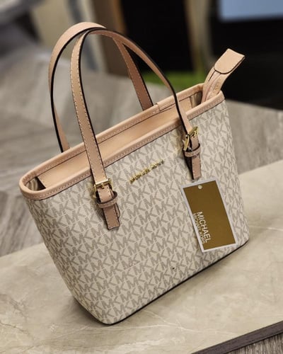 مايكل كورس- سيجنتشر