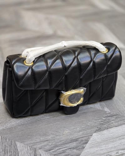 كوتش - تابي شولدر