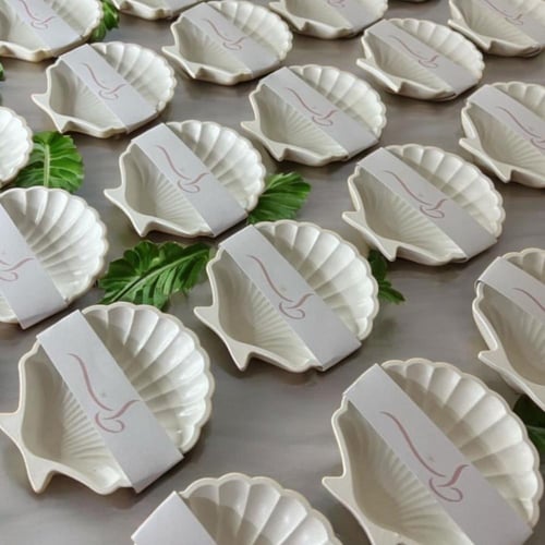 توزيعات كوستر صدفة بتنسيق ثيم