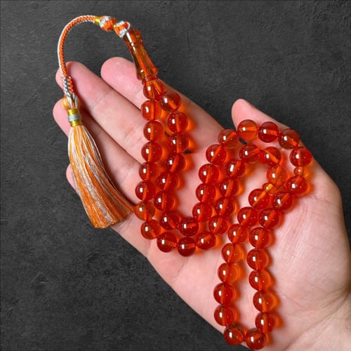 سبحة زعفران برائحة 11 ملم برتقالي شفاف