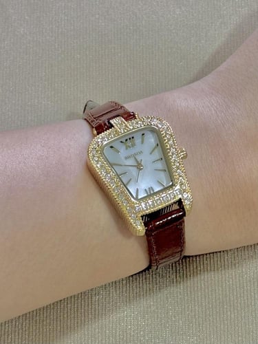 ساعة بروشا ذهبي جلد بني