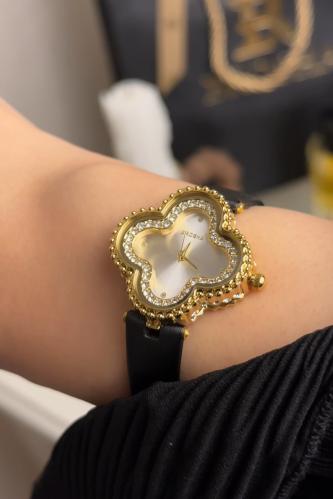 ساعه بروشا نسائي جلد اسود ذهبي