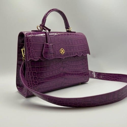 حقيبة (مرزم) باللون البنفسجي