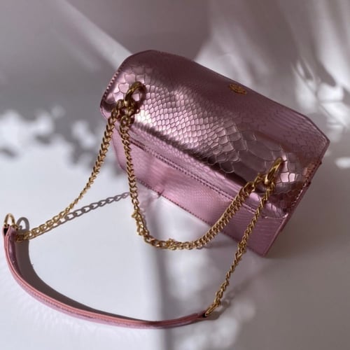 حقيبة (فرس) باللون الوردي اللامع