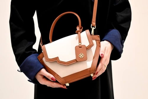 حقيبة (كوكب) باللون البيج صغير