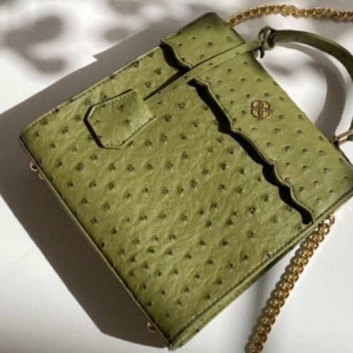 حقيبة (مرزم) باللون العشبي