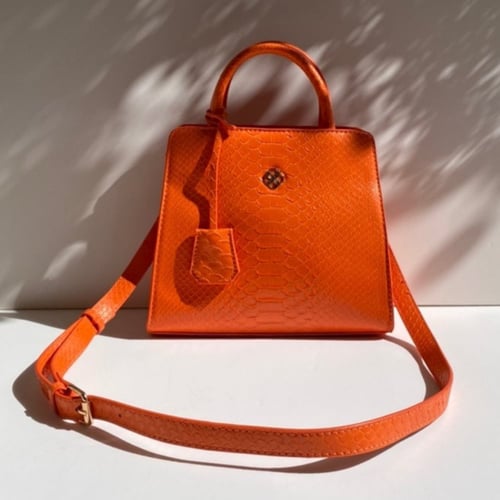 حقيبة ( قوس) باللون البرتقالي