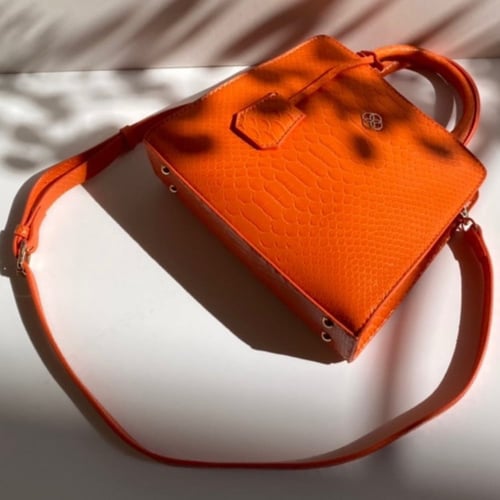 حقيبة ( قوس) باللون البرتقالي