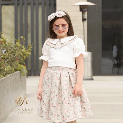 تنورة مشجر وبلوزه كرانيش