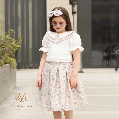 تنورة مشجر وبلوزه كرانيش