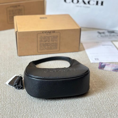 حقيبة كوتش باللون الاسود