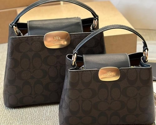 حقيبة كوتش بعدة الوان