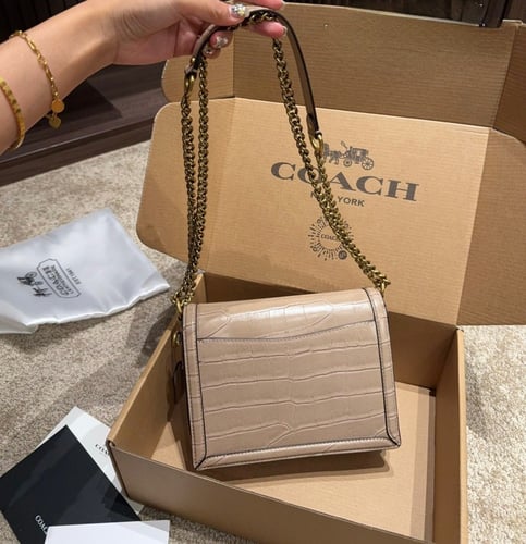 حقيبة كوتش جلد / لونين