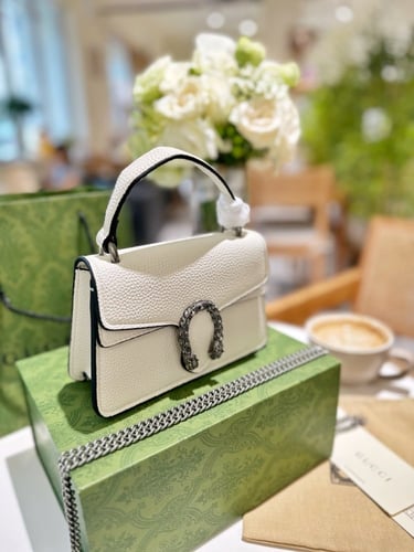 شنطه قوتشي بعده الوان