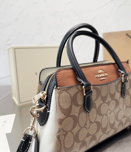 حقيبة كوتش بمقبض ٣ الوان