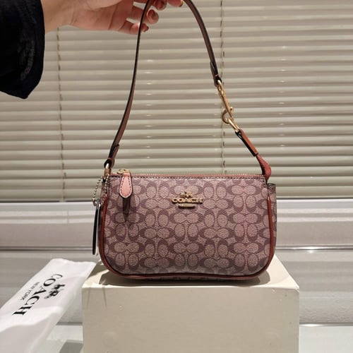 حقيبة كوتش بيج بقلوب