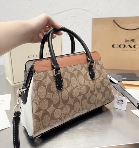 حقيبة كوتش بمقبض ٣ الوان