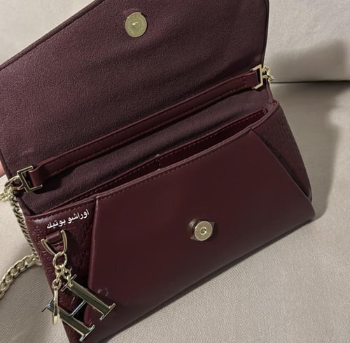 حقيبة كارولينا هيريرا | عودي