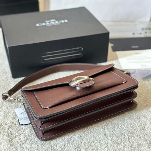 حقيبة كوتش تابي