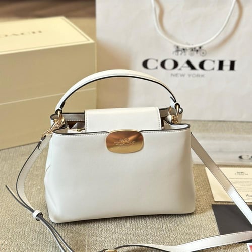 حقيبة كوتش ابيض