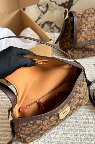 حقيبة coach بحجمين