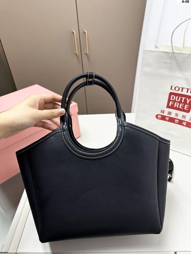 حقيبة ميو ميو