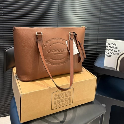 حقيبة كوتش بعدة الوان